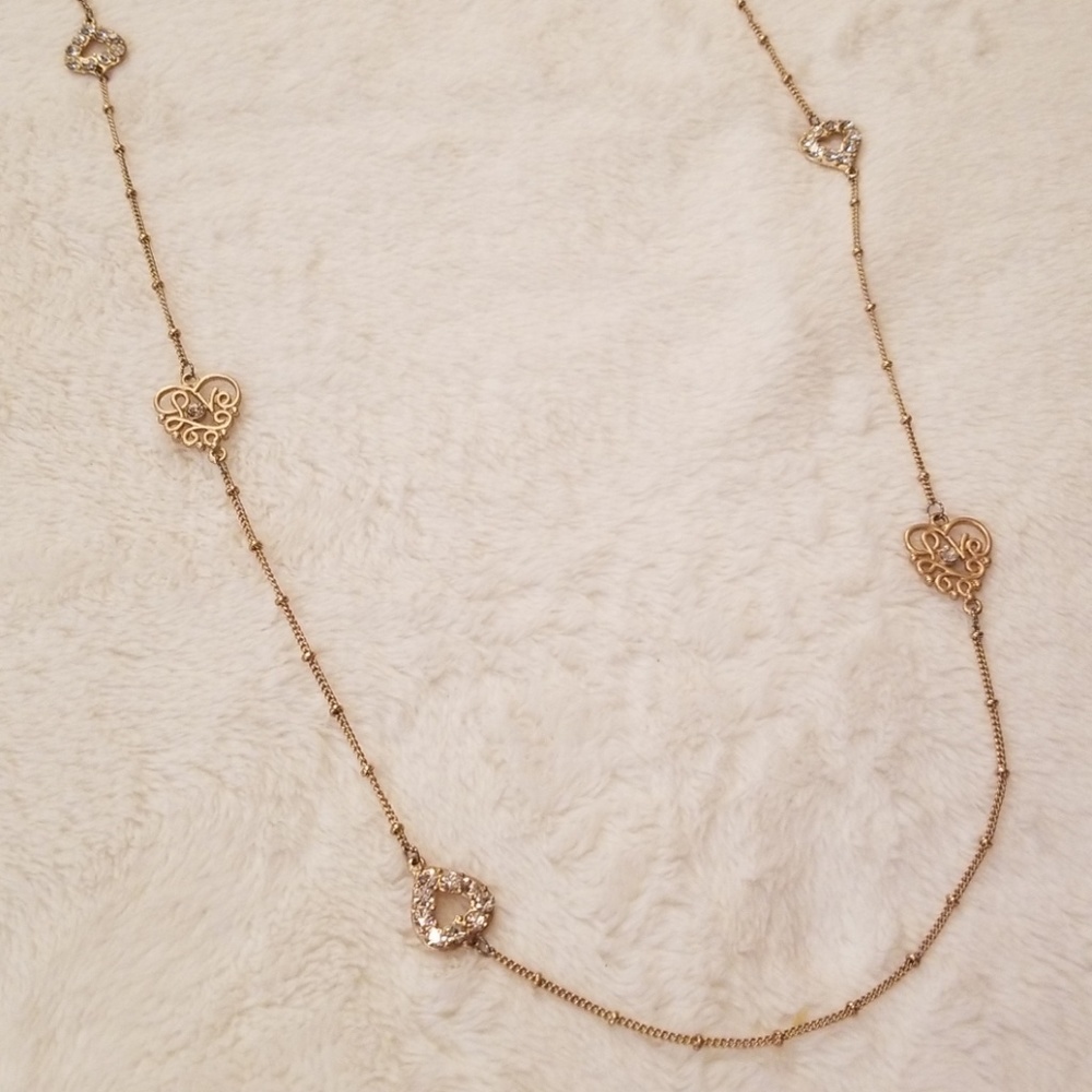 Thin golden long necklace
